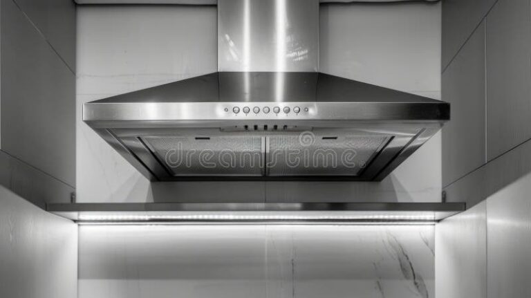 stainless steel range hood installed modern kitchen sleek appliances white countertops stainless steel range 357238354