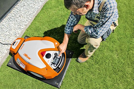 how to set up a robot lawn mower in a small yard